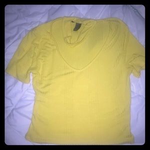 Bright yellow crop top